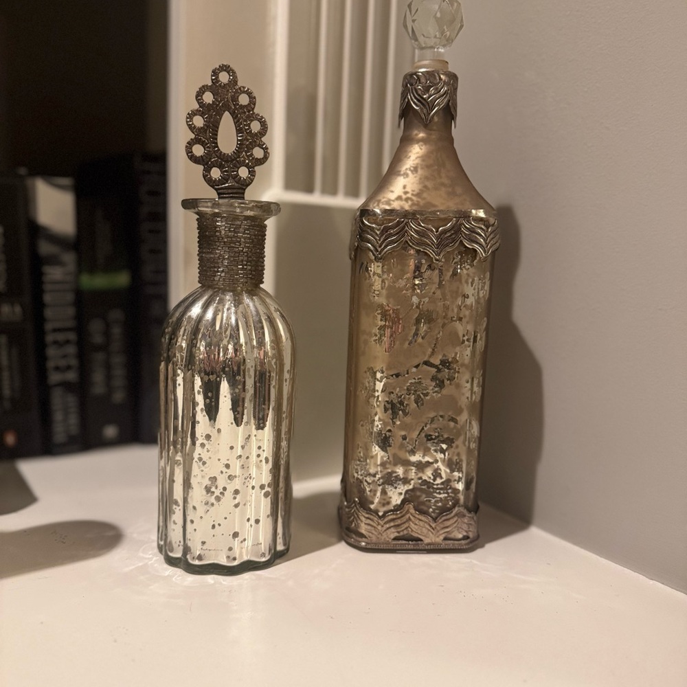 Elegant Silver and Gold Decorative Bottles